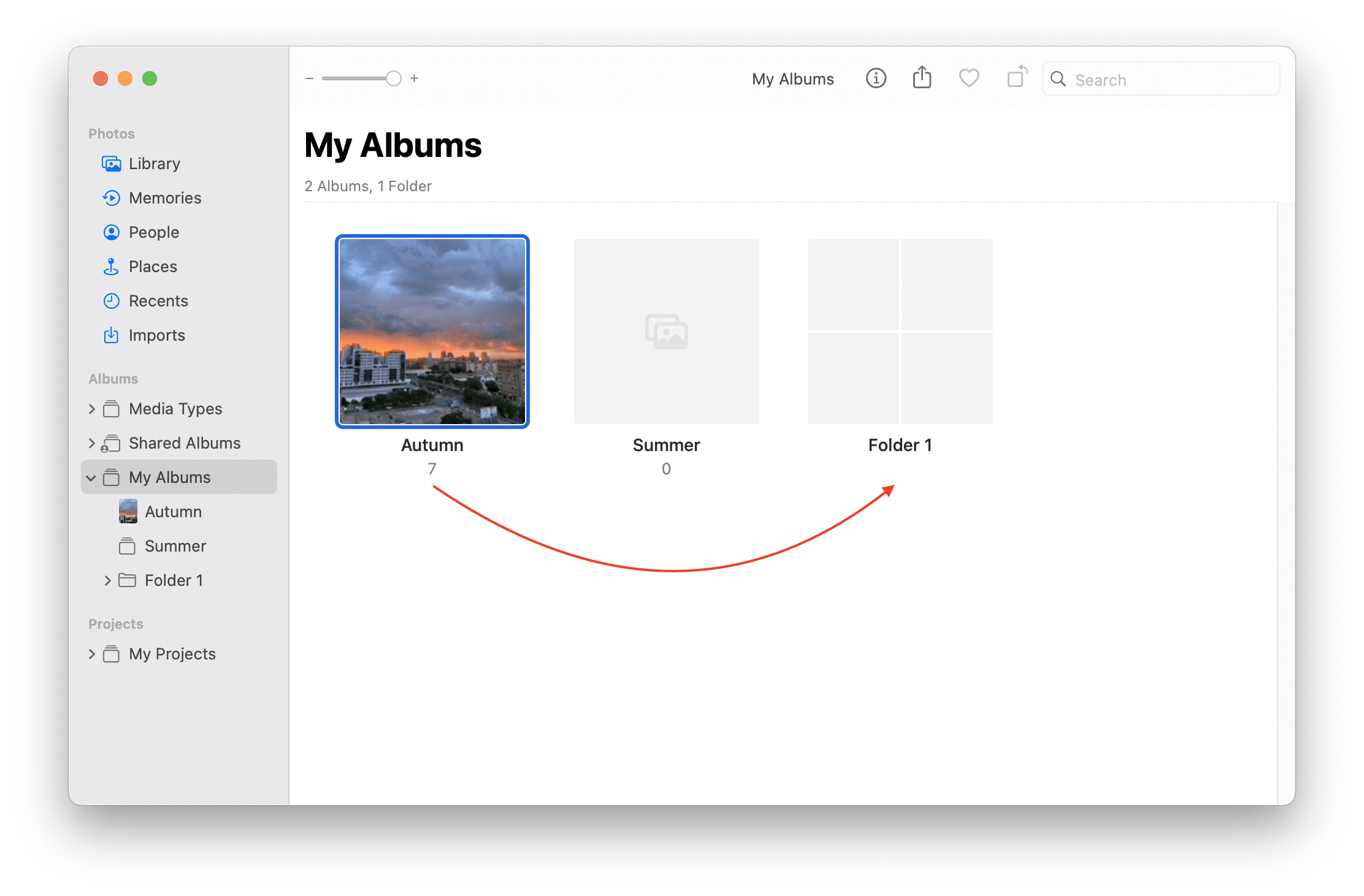 Photos app showing how to add albums to folders