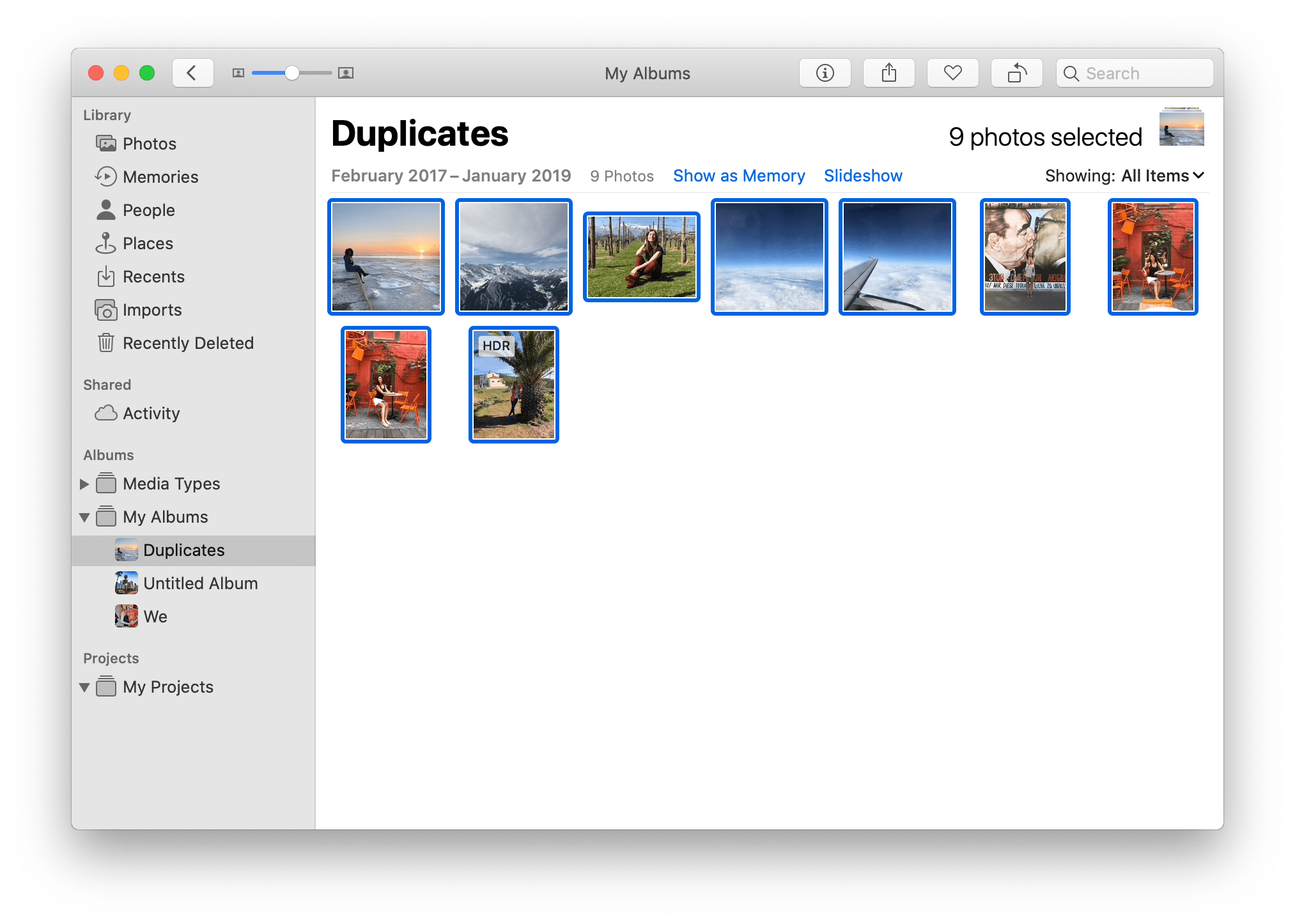 Photos app with selected pictures in Duplicates album