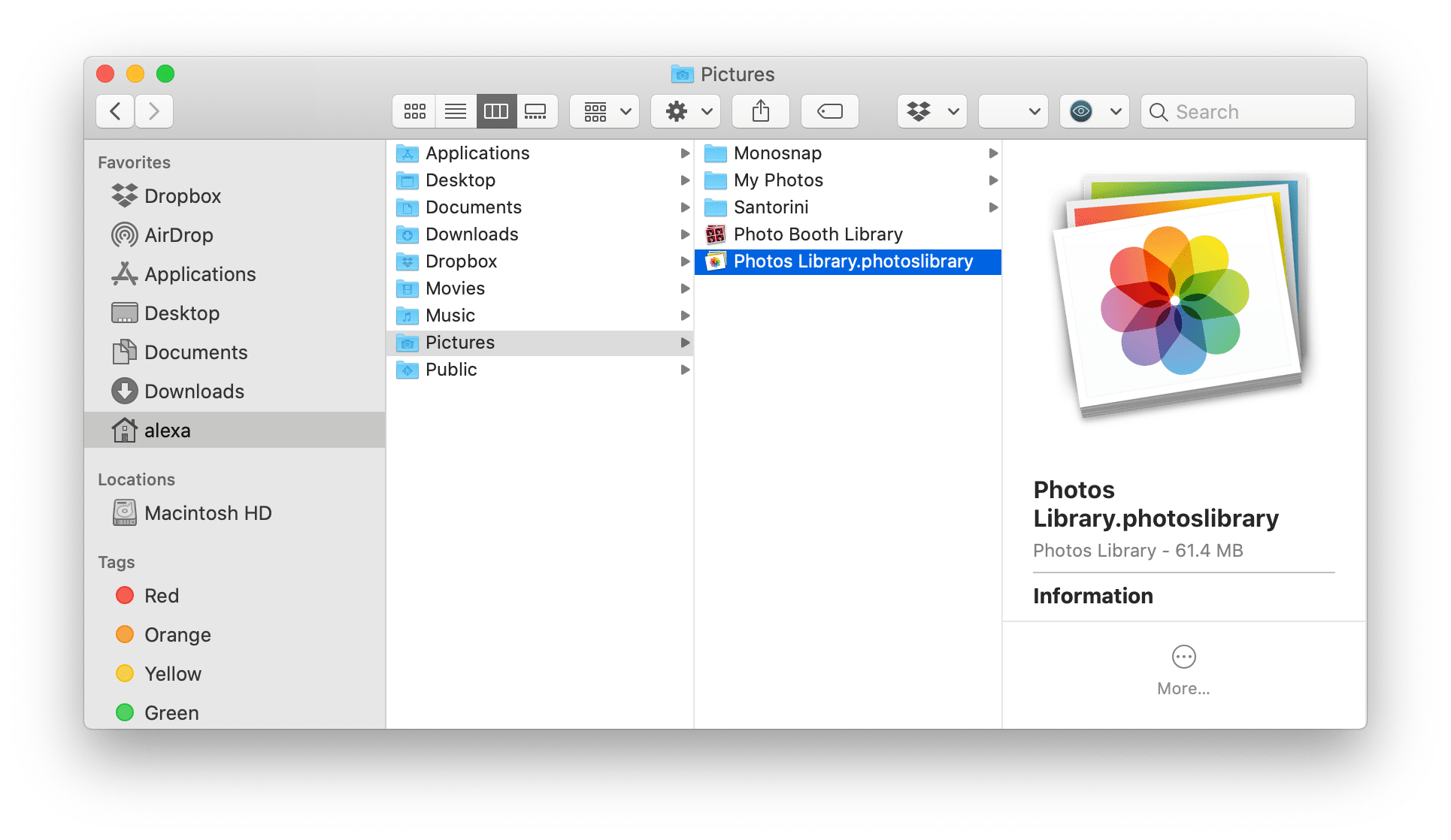 Finder window showing Photos library location
