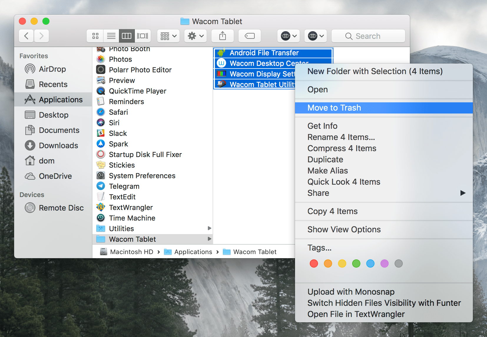 Choosing Move to Trash command for Wacom Tablet folder content in Finder