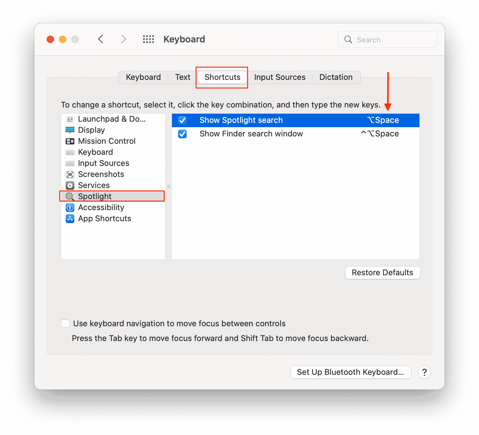 System Preferences window showing how to set a new shortcut for Spotlight