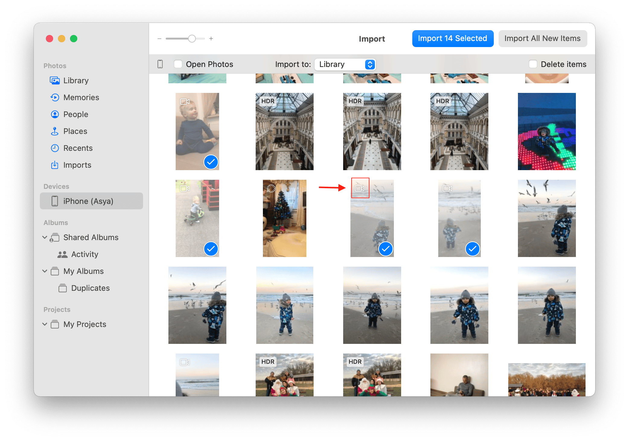 Photos app window showing selected videos for importing