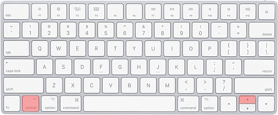 Apple keyboard showing shortcut for Mission Control