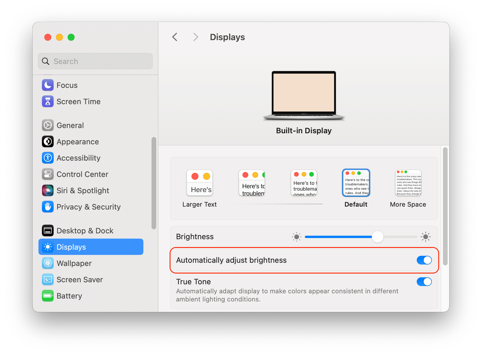 System Settings showing the Brightness panel