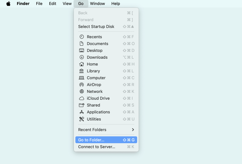 Finder menu showing the Go to Folder option