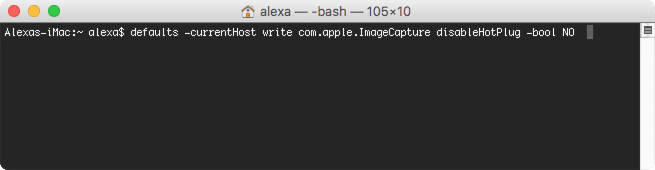 Terminal window with entered command for iPhoto autorun